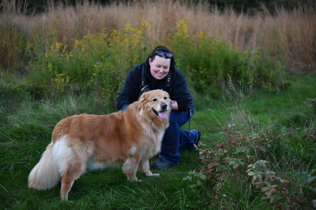 Kate with her dog outdoors